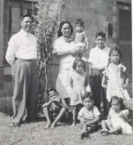 Maria at her parents Evangelina and Manuel Silva and her six siblings.Taken in front of there home in Laredo.